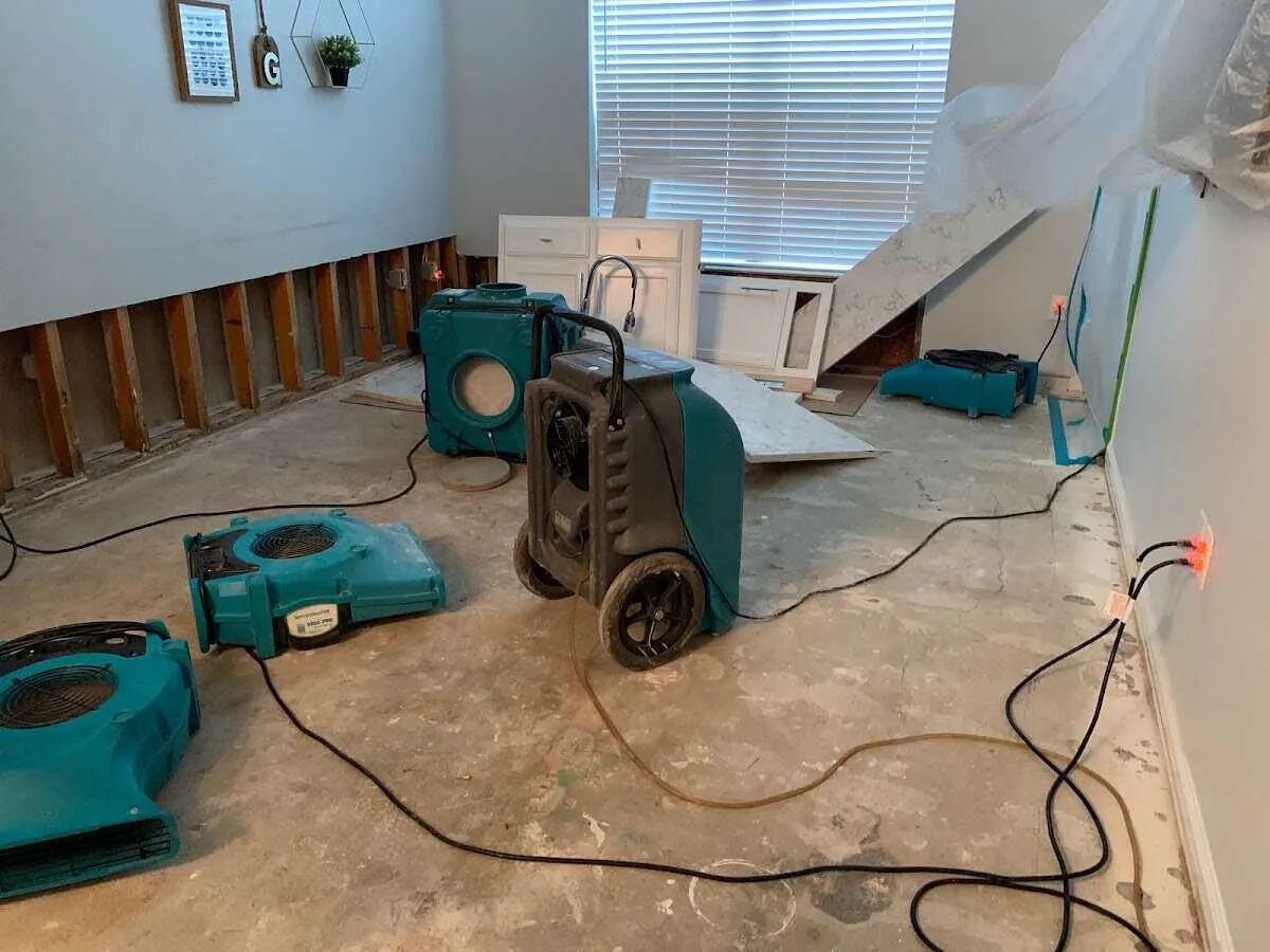 Dehumidifier in flood-cut room for Water Damage Restoration in Saco